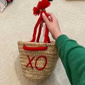 XO straw tassel bucket bag